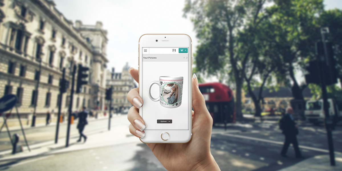 Taopix Creator On mobile device woman's hand