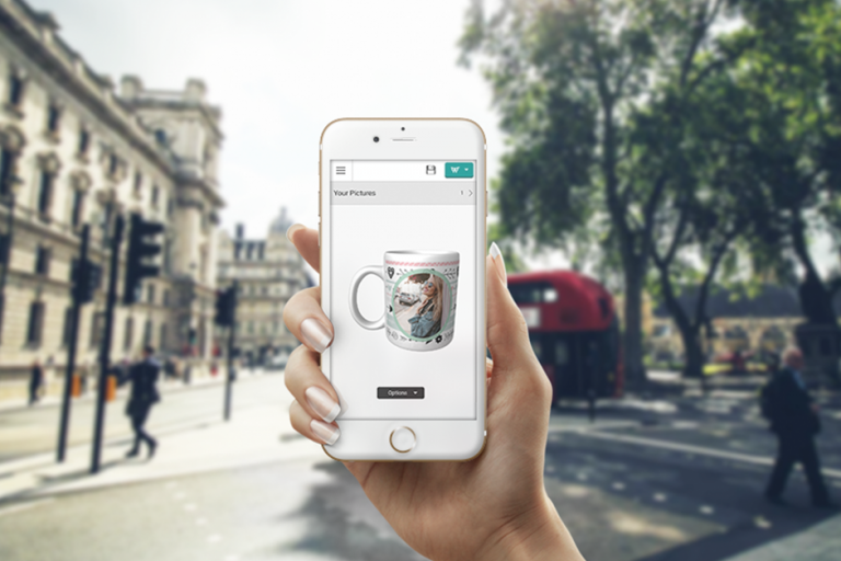 Taopix Creator On mobile device woman's hand