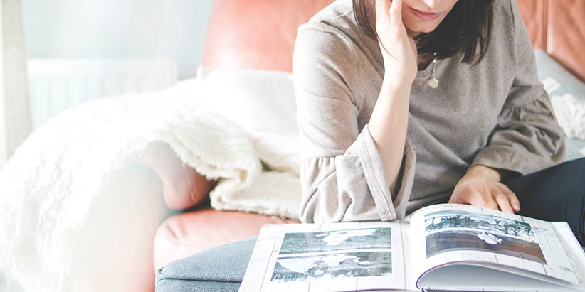 Lady looking at printed photobook