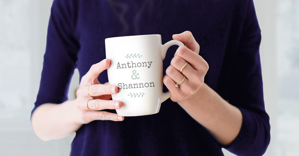 woman's hands holding personalised mug